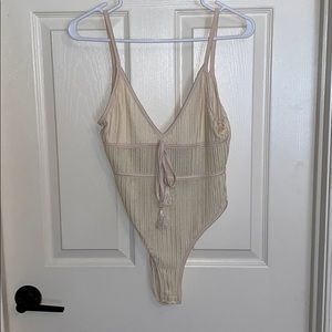 Cream body suit (tag attached)